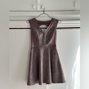 Size 6 US Light purple fitted dress with silk like ribbon details.